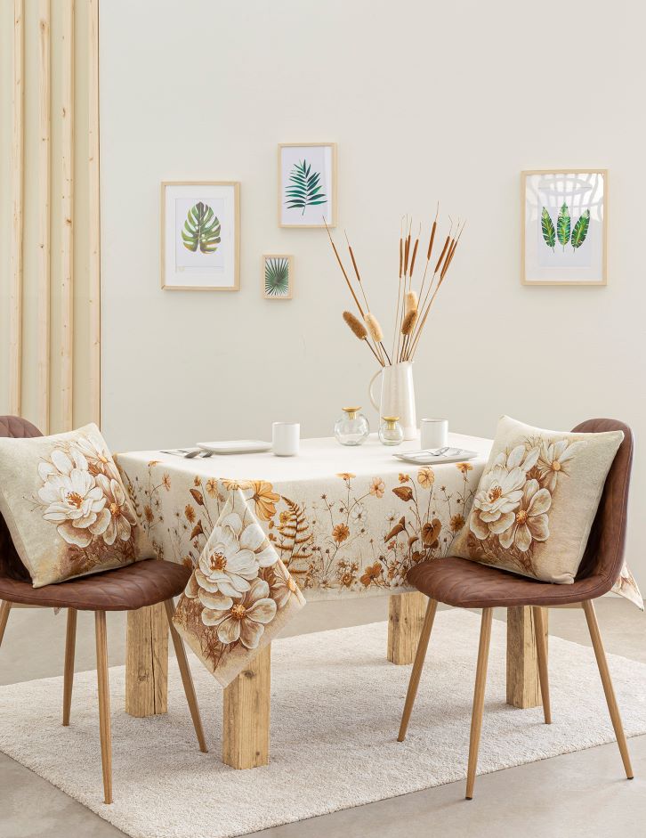 Jacquard tablecloth with white and golden flowers. NITRA