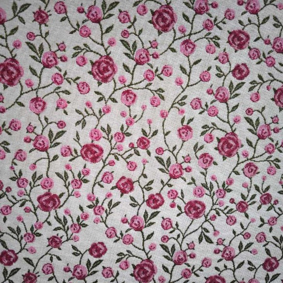 WINS jacquard fabric with pink flowers and green leaves. Width: 140 cm