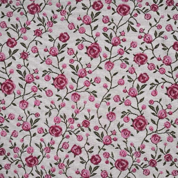Tejido Jacquard WINS con flores rosas y hojitas verdes. Ancho 140