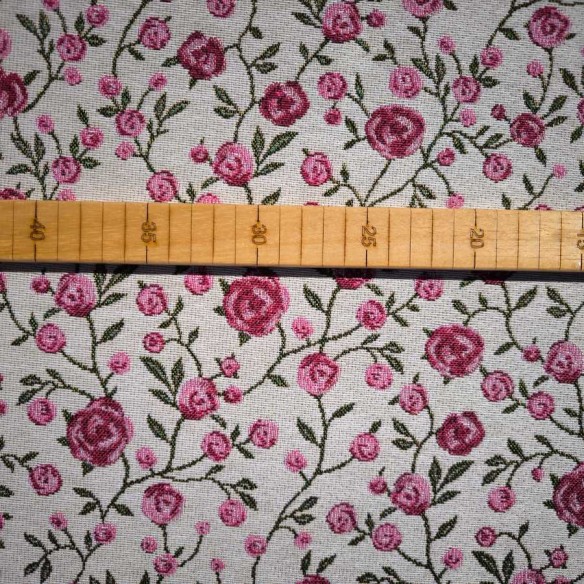 WINS jacquard fabric with pink flowers and green leaves. Width: 140 cm
