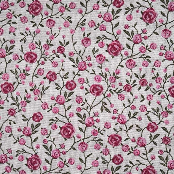 WINS jacquard fabric with pink flowers and green leaves. Width: 140 cm