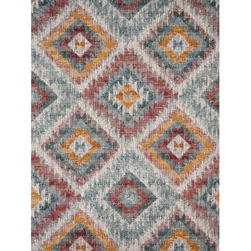 Jacquard LOSANGO Ikat fabric with geometric motifs in red, green and yellow. Width 140 cm.