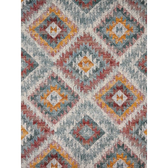 Jacquard LOSANGO Ikat fabric with geometric motifs in red, green and yellow. Width 140 cm.