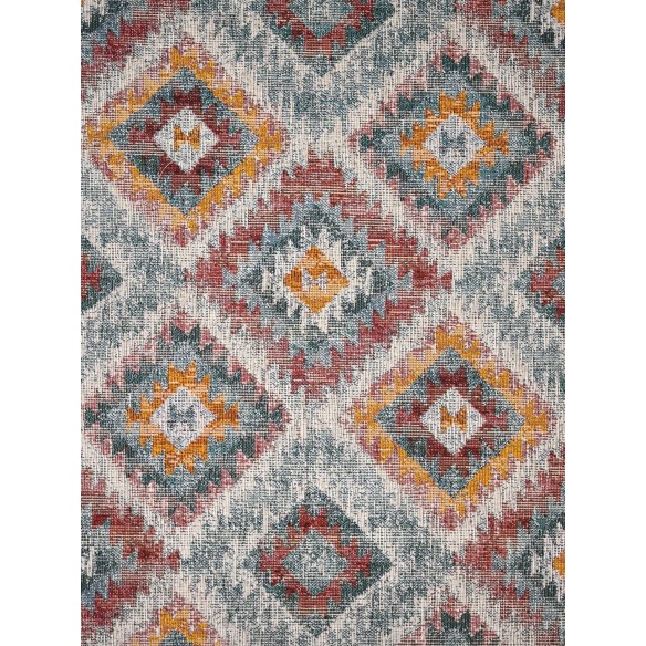 Jacquard LOSANGO Ikat fabric with geometric motifs in red, green and yellow. Width 140 cm.