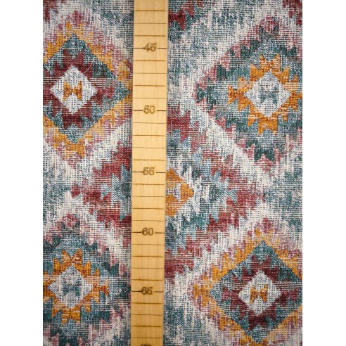 Tejido Jacquard LOSANGO Ikat con motivos geometricos rojos verdes y amarillos. Ancho 140