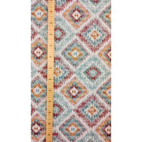 Tejido Jacquard LOSANGO Ikat con motivos geometricos rojos verdes y amarillos. Ancho 140