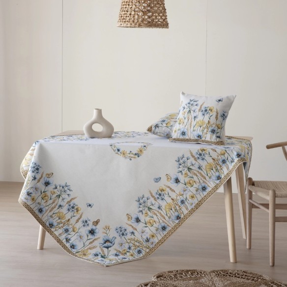 Mantel estampado floral en tonos azul y amarillo sobre fondo blanco roto - BLAT